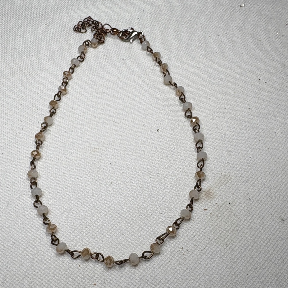 Elegant Beaded Necklace in Silver and White.